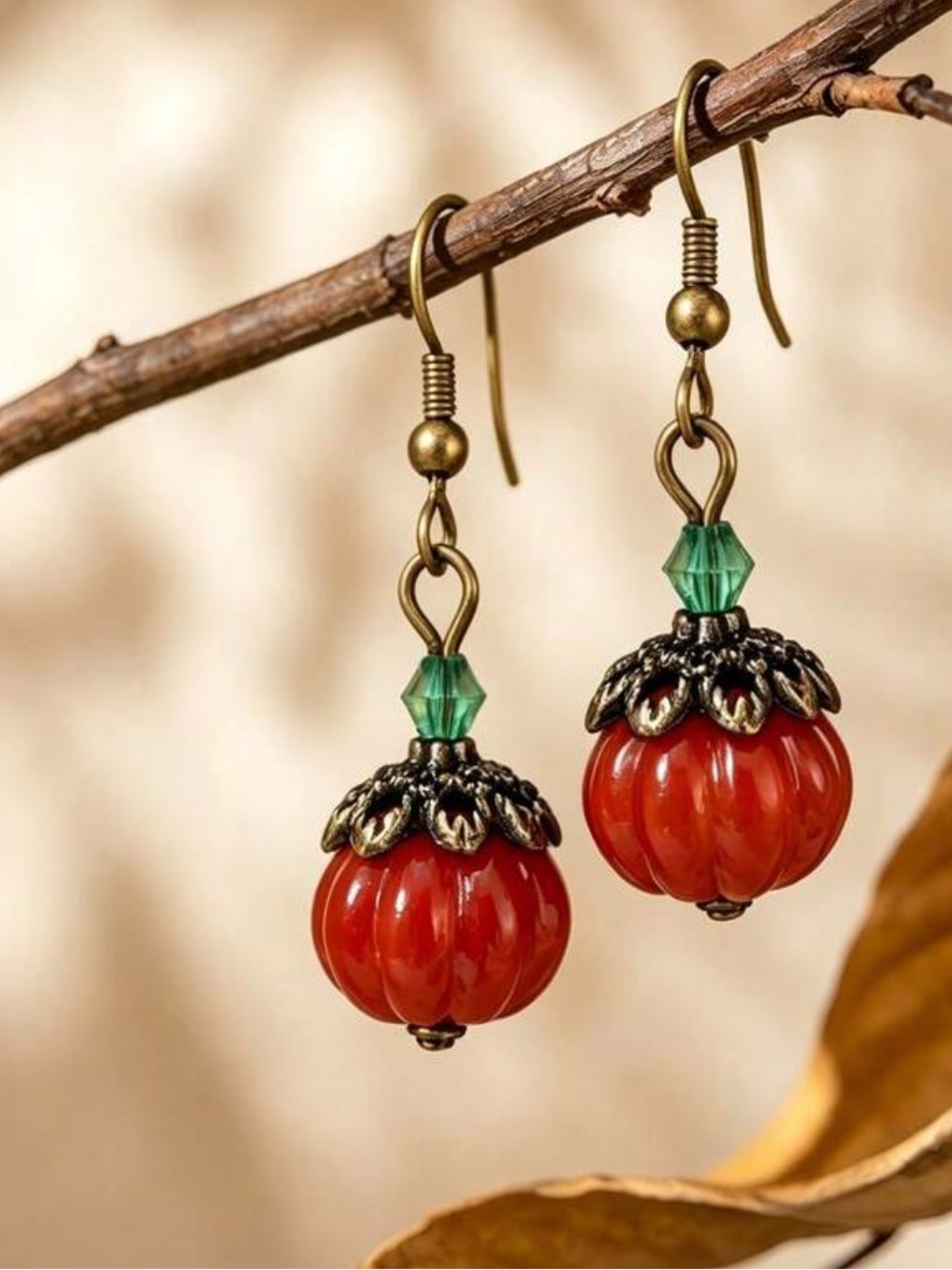 Orange Pumpkin Bead Drop Earrings with Green Accent